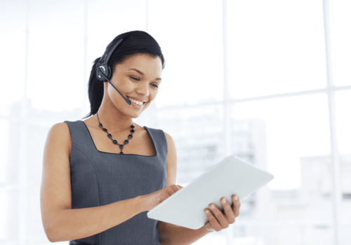 Woman wearing an office headset for softphone use