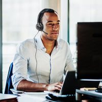 Office worker using a Leitner Corded Headset