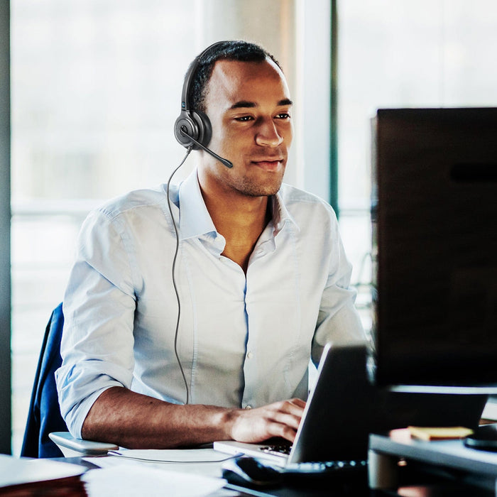 Office worker using a Leitner Corded Headset