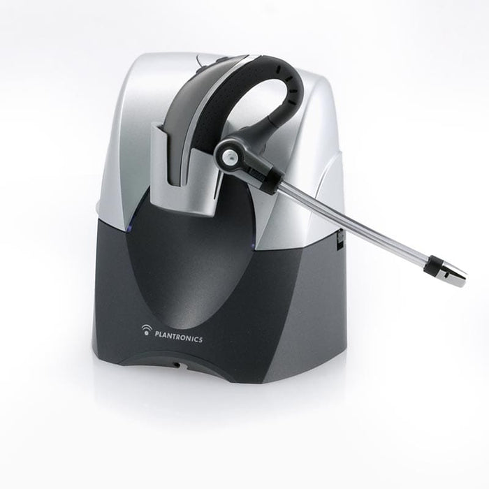 Plantronics CS70 shown next to charging base