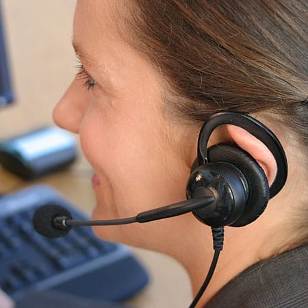 The Headsets.com Rhapsody headset being worn on the ear